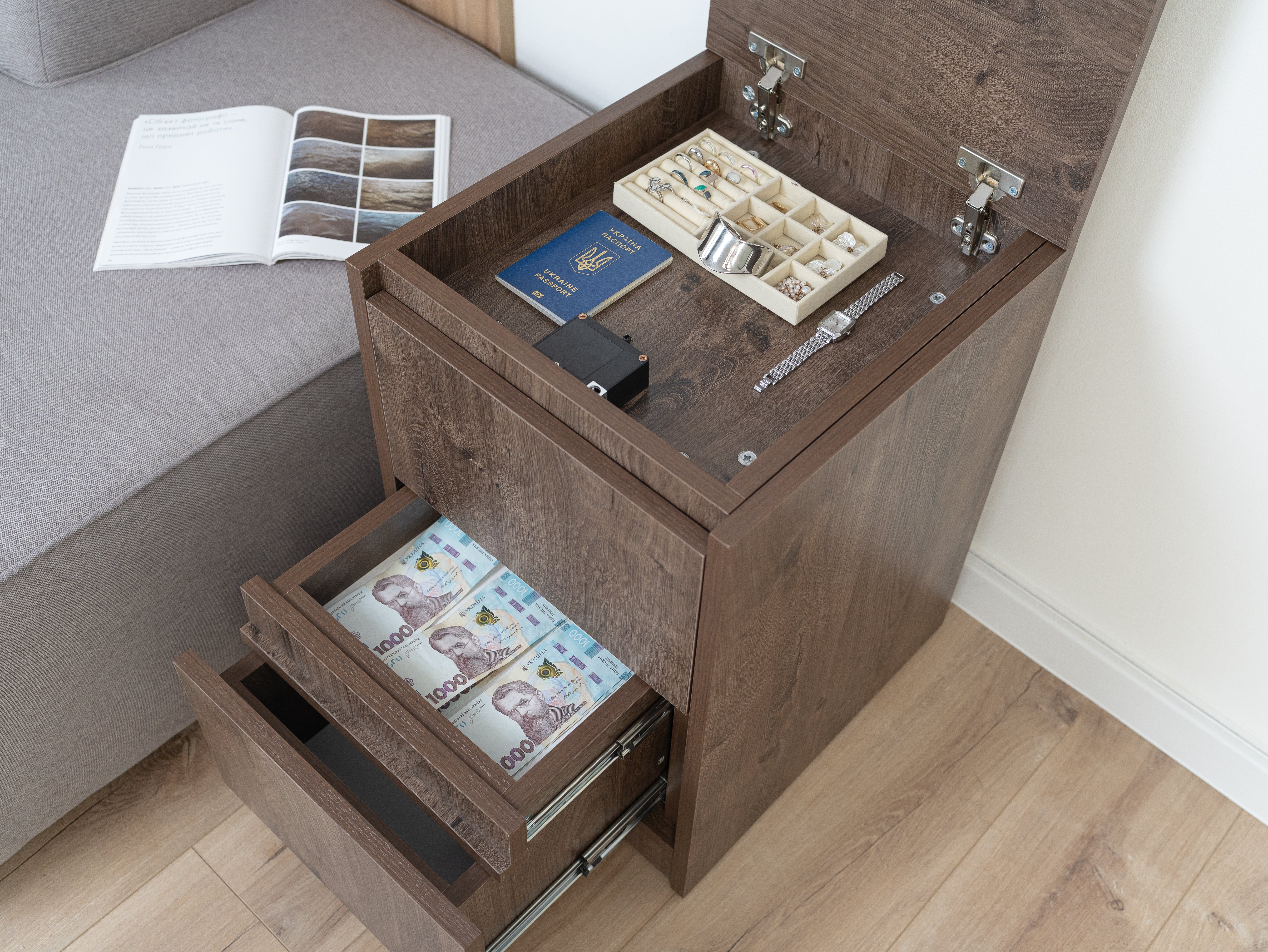 A modern cabinet featuring hidden compartments for storing valuables and personal items