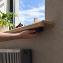 B01 magnetic hidden storage box being mounted discreetly underneath a wooden shelf