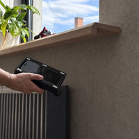 B01 hidden storage box removed from under a shelf with a smartphone stored inside