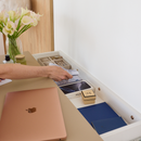 Close-up of A14 concealed storage drawer with valuables and personal belongings