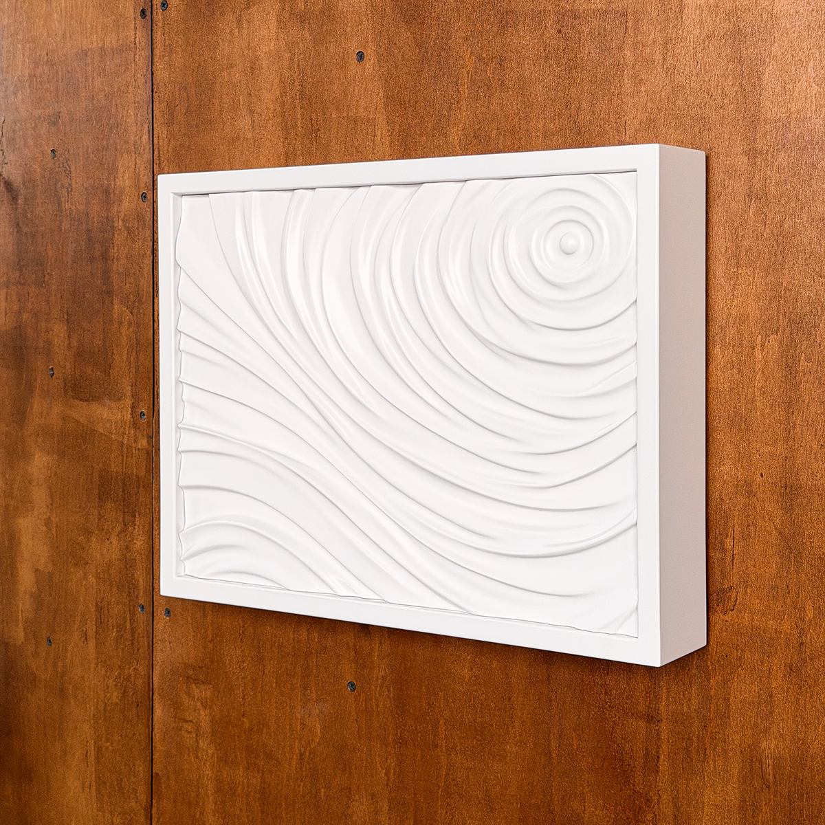 White D01 sculptural wall art with concealed RFID storage mounted on a wooden wall.