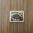 Fishing-themed carved wooden wall art with white frame and hidden storage compartment