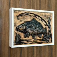 Close-up of fishing wall decor with carved carp design, fishing rod and white frame