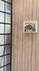 The video showcases the D01 Fisherman wall decor, showing how it looks on a wooden wall panel and how the hidden compartment opens using a contactless RFID key card. Inside the concealed storage area, valuables and cash are securely stored.